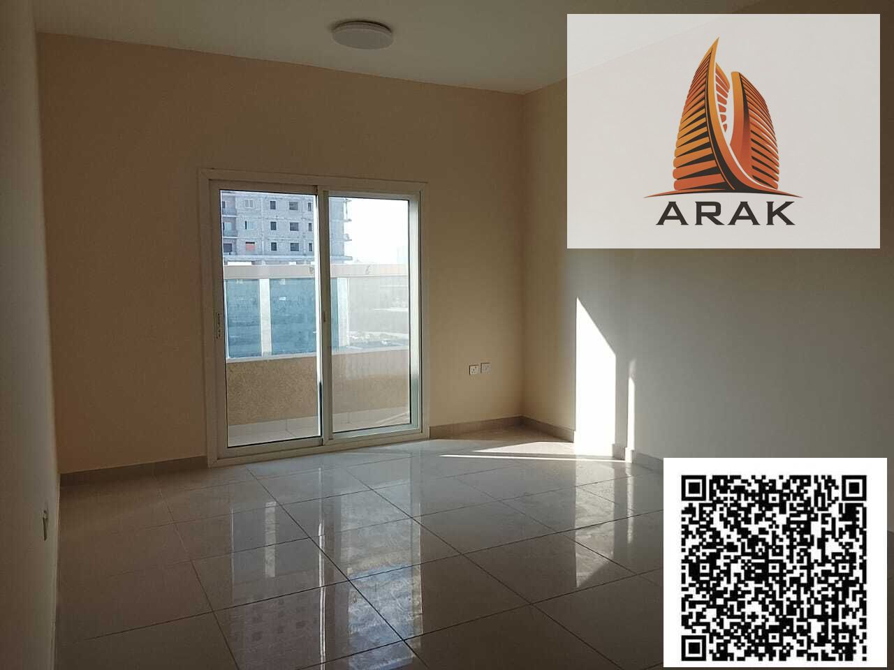 For annual rent, a one-bedroom apartment with a living room in Salem Tower, Al Nuaimiya 2 area, located directly on Khalifa Street,