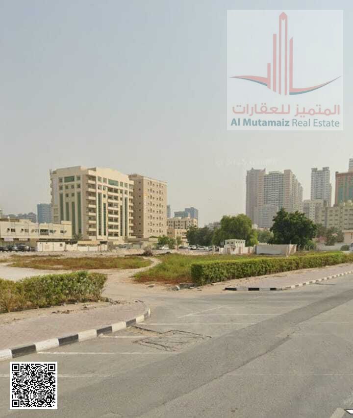 Land for sale in Ajman, Al Rashidiya 3, residential/commercial, G+16, area 21,600 sq ft, main street, asking price 8,500,000 AED*