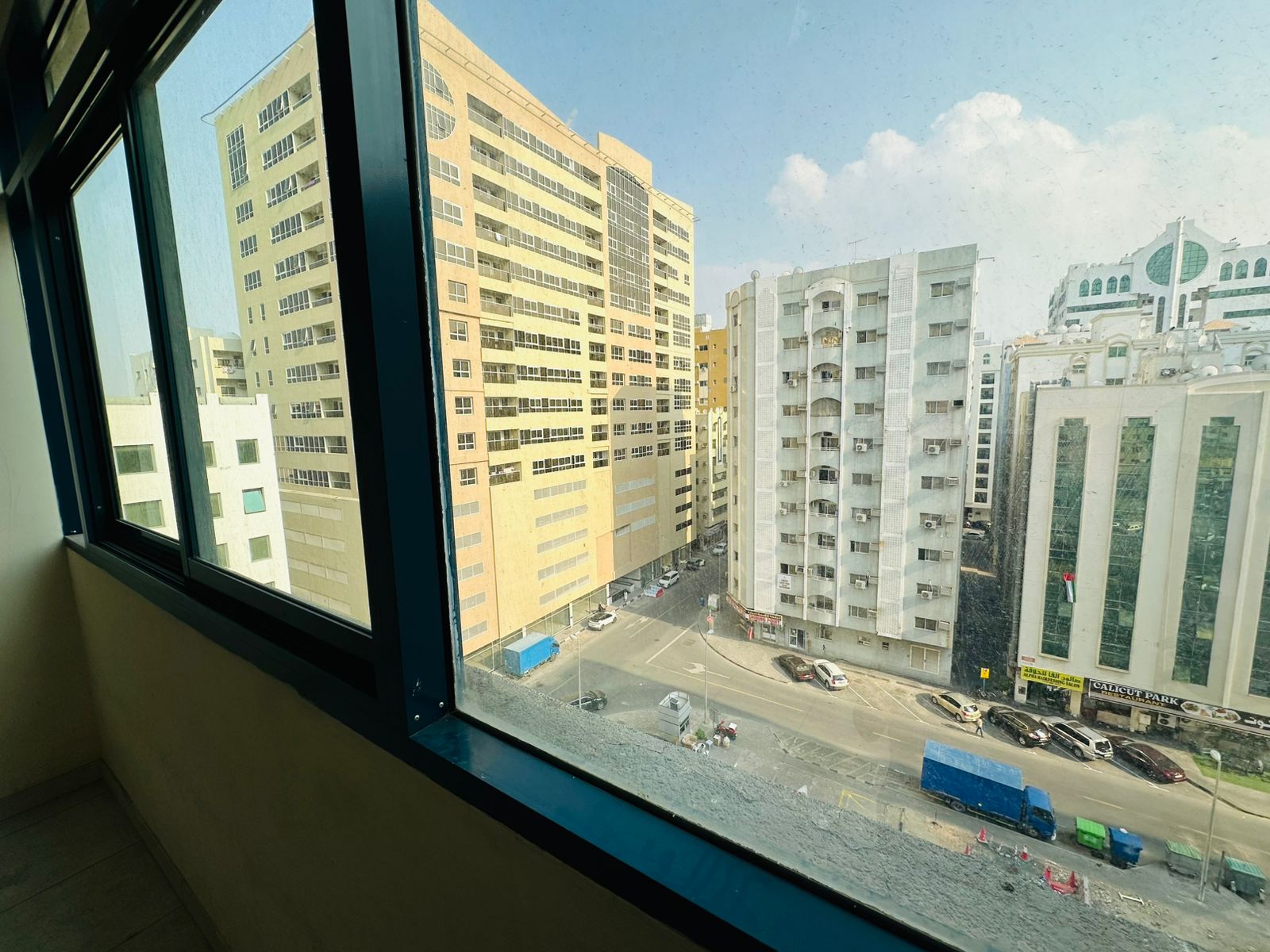 Cheapest 1BR + living room with free AC and open view in Al Qasimia Al Mahatta.