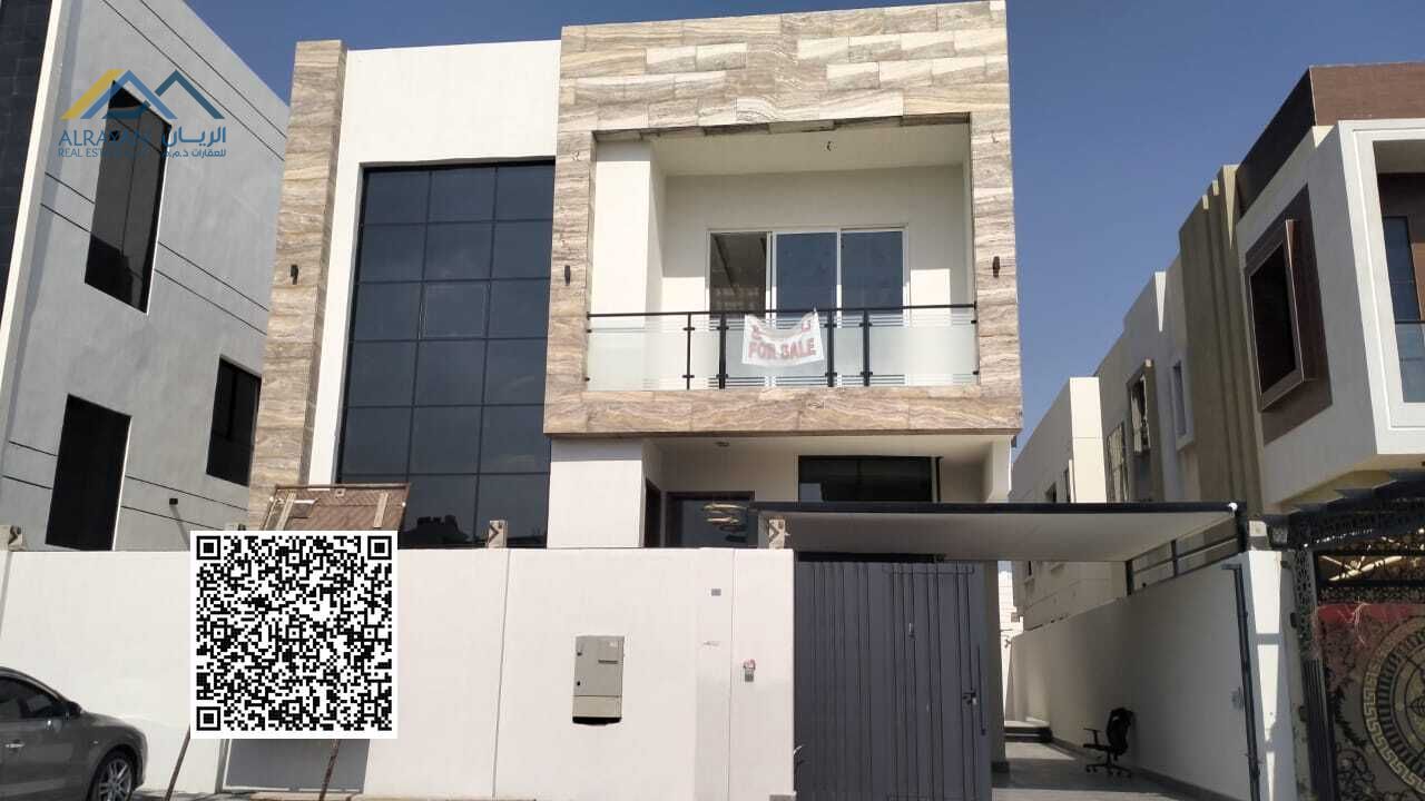 Luxury villa for sale in Ajman, Al Yasmin, with a super deluxe finish. The villa boasts an excellent location, just 4 minutes from Al Yasmin Park