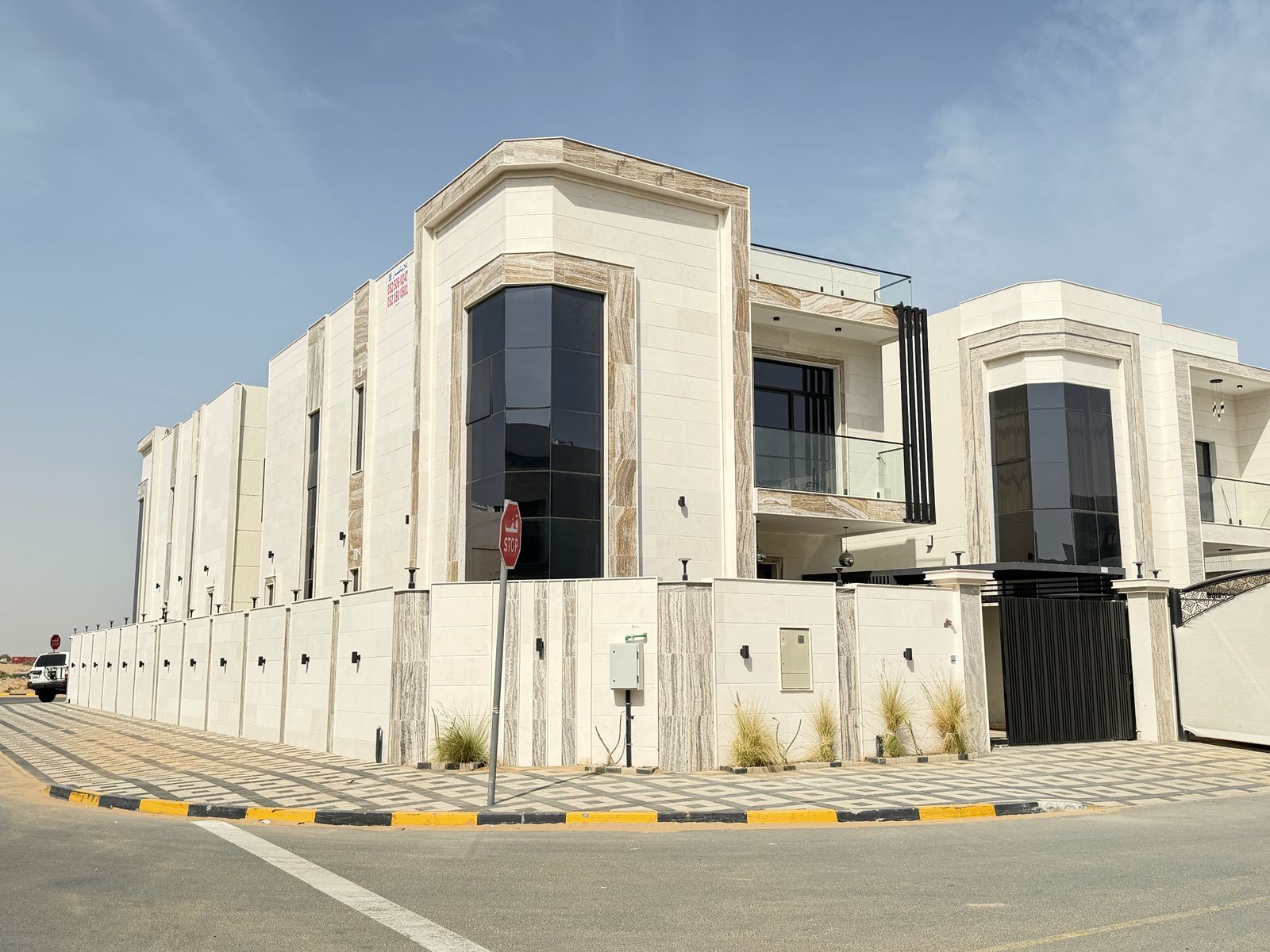 Villa for rent in Al Yasmin, first occupancy, opposite Al Rahmaniya, Sharjah. Prime location. The villa consists of 6 master bedrooms, a living room,