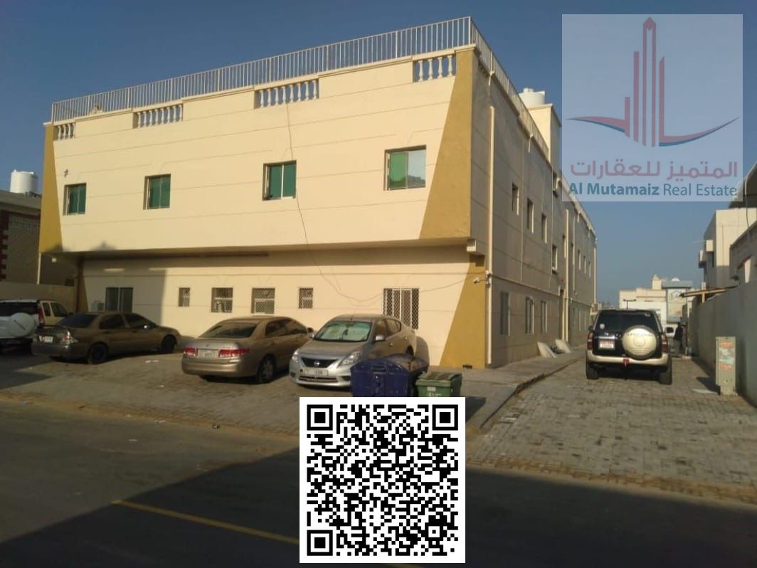 Two-bedroom apartment with living room, 3 bathrooms, and kitchen in Al Rawda area