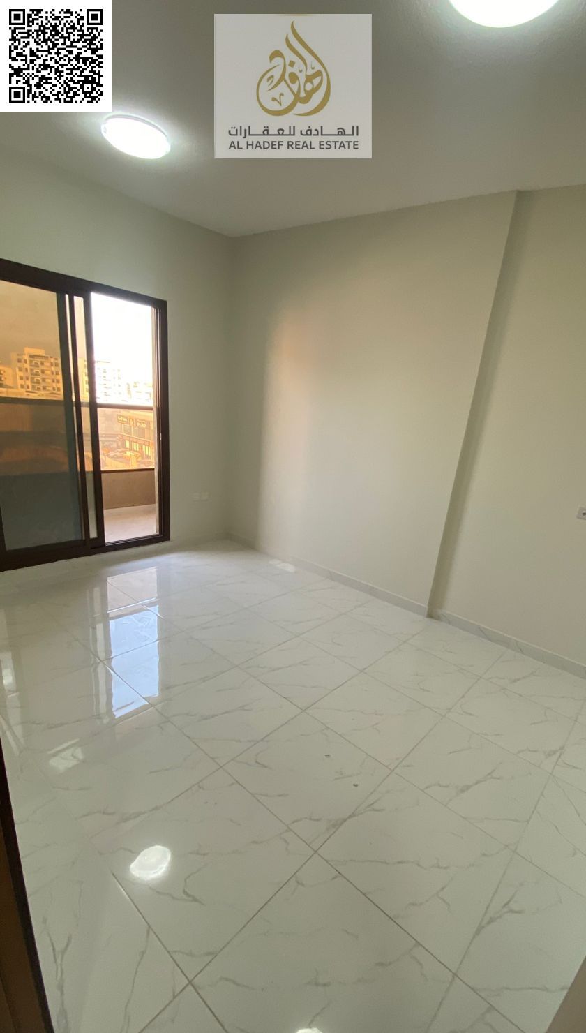 One Bedroom Apartment with Balcony and Two Bathrooms for Rent in Al Rawda 1 Ajman Master Room Wardrobe Flexible Payments Near Hamidiya Police