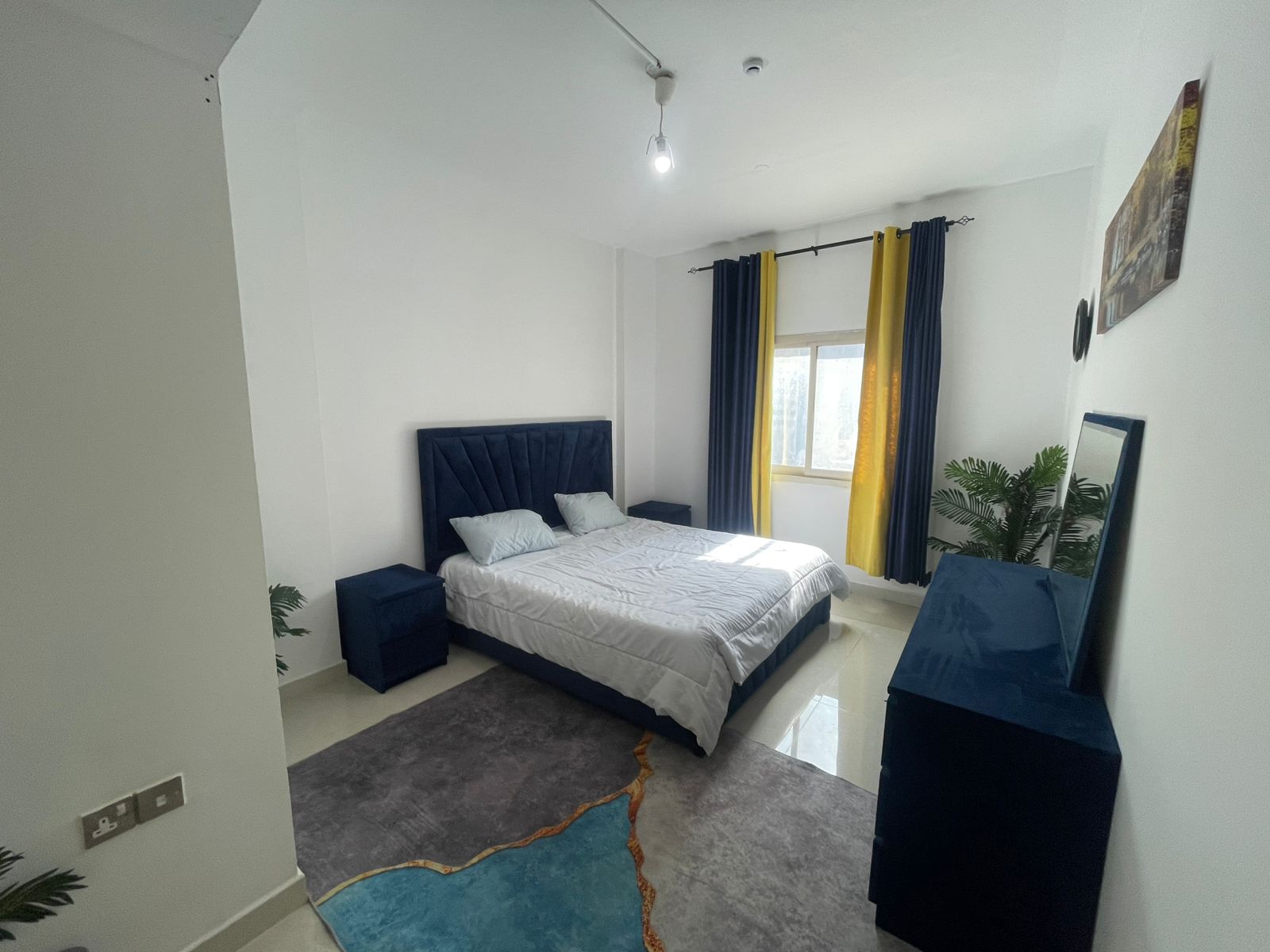Apartment for sale in Al Taawun Al Kananah, 2 bedrooms and hall, 90 sqm, central AC, good rental income, AED 400,000, two units available.