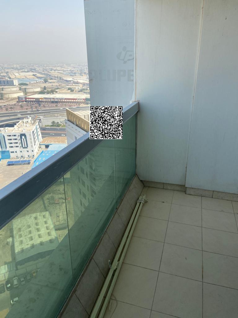 One bedroom and living room apartment for sale in Ajman Pearl Towers with an open view and two bathrooms. Apartment size: [Area not specified]