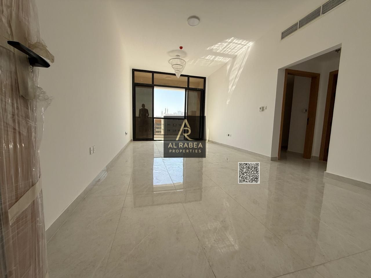 One-bedroom apartment with built-in wardrobes for rent in a brand new tower in Al Jurf 2.