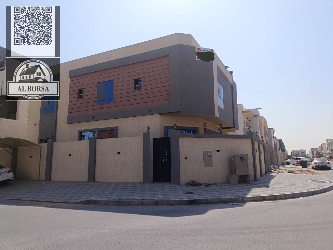 For sale in Al Yasmin, a corner villa with 6 bedrooms, a majlis, a living room, a spacious kitchen, and a maid's room.