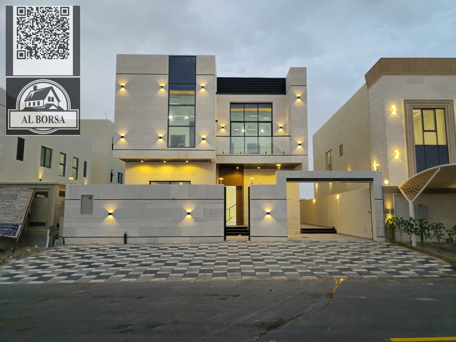 For sale in Al Helio 2, Ajman: a villa with 5 master bedrooms, a majlis, a living room, a spacious kitchen, and a maid's room.