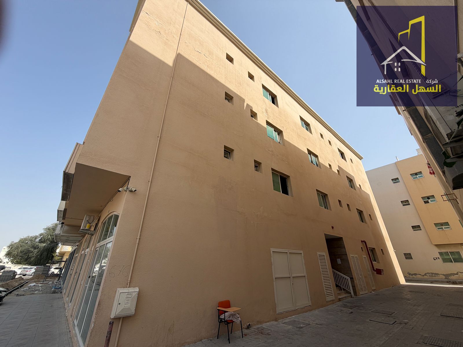 For sale is an investment building located in Muwaileh Commercial, Emirate of Sharjah, featuring a prime location behind Al Thiqah Club
