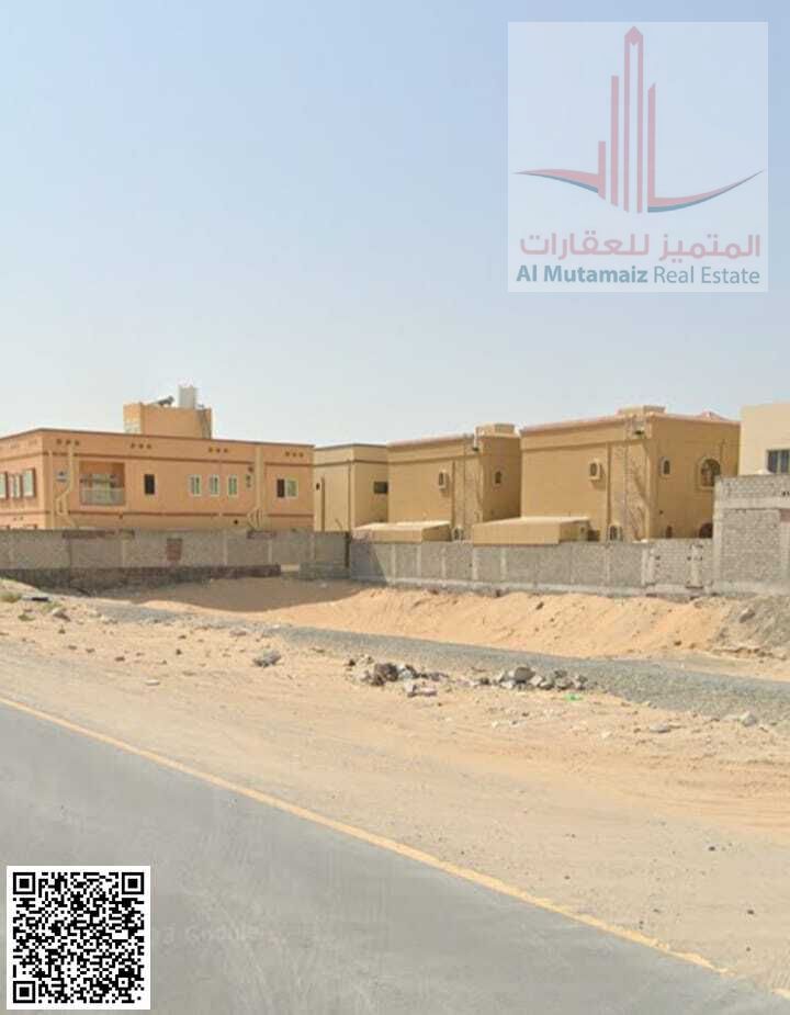 Land for sale in Ajman, Al Muwaihat 1, residential/commercial (G+2), area 9687 sq ft, corner plot. Asking price 3,200,000 AED.
