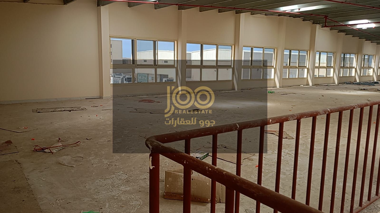 A fully integrated complex consisting of warehouses and shops, located on a main street.