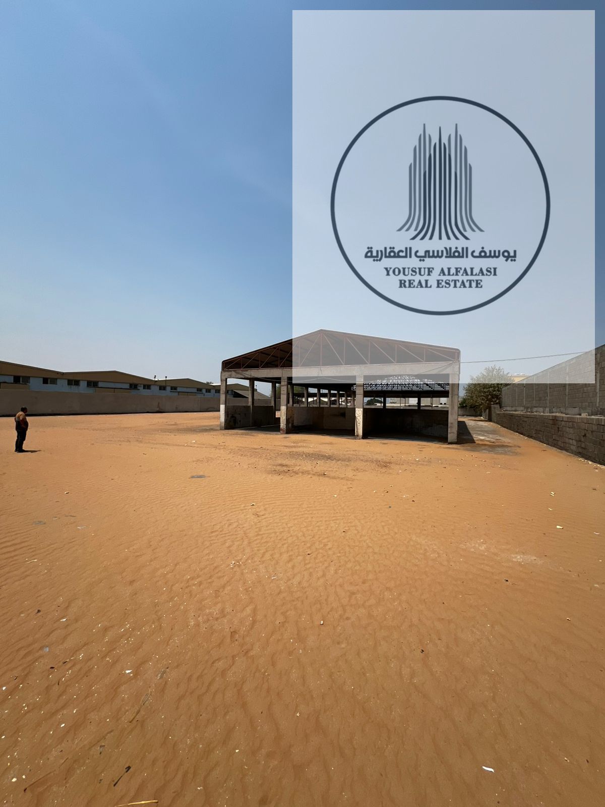 Fenced yard for rent 45000 sqft Umm Al Quwain with labor housing shop cover great price