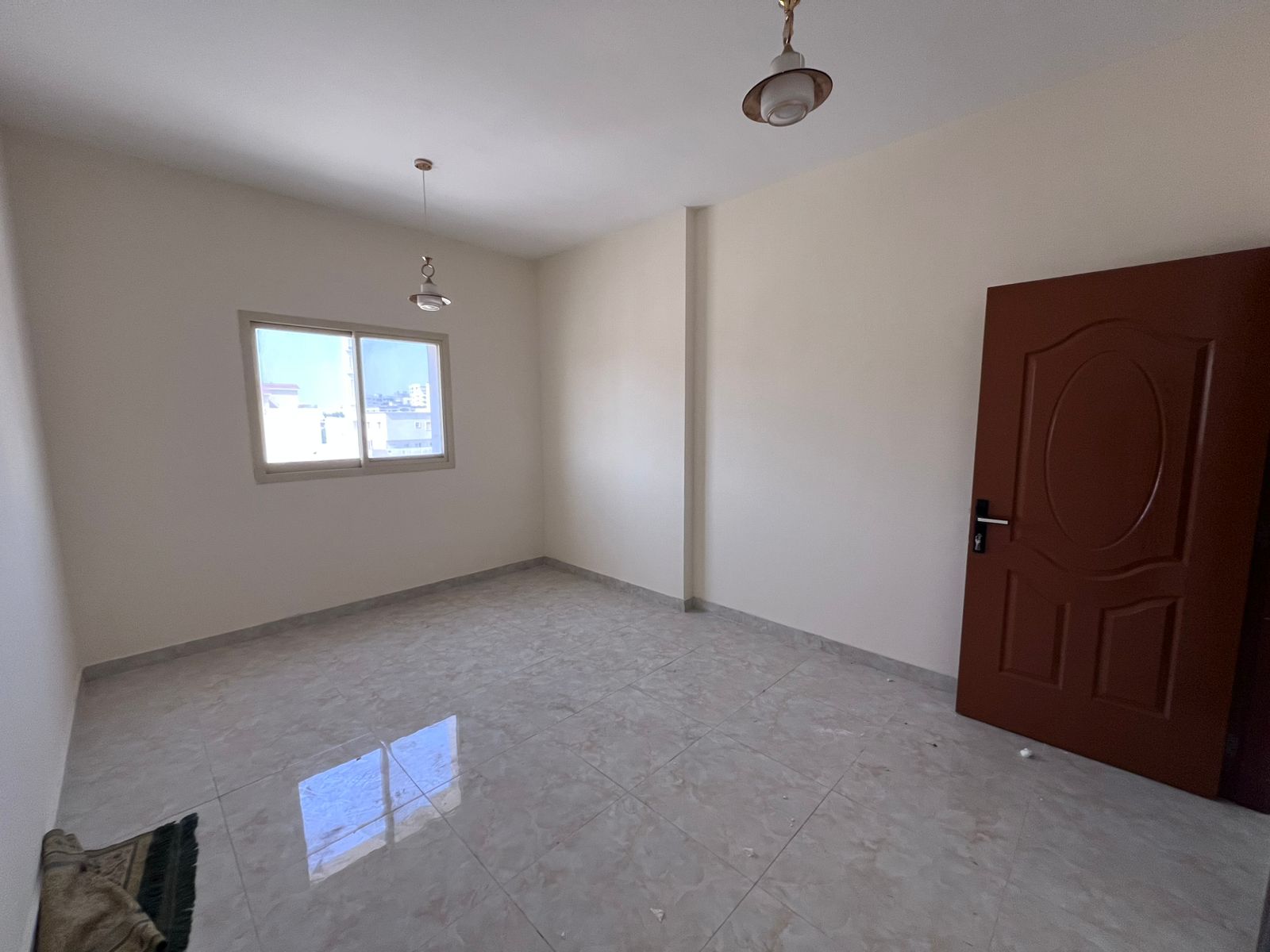 Al Rawda Room and Lounge, next to Sheikh Ammar Street, prime location close to all services