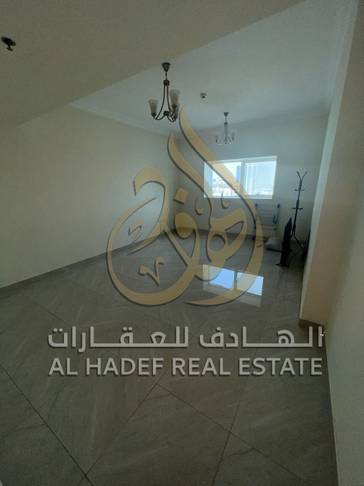 Two-bedroom apartment with a living room in a prime location with free parking in Al Majaz 2 area