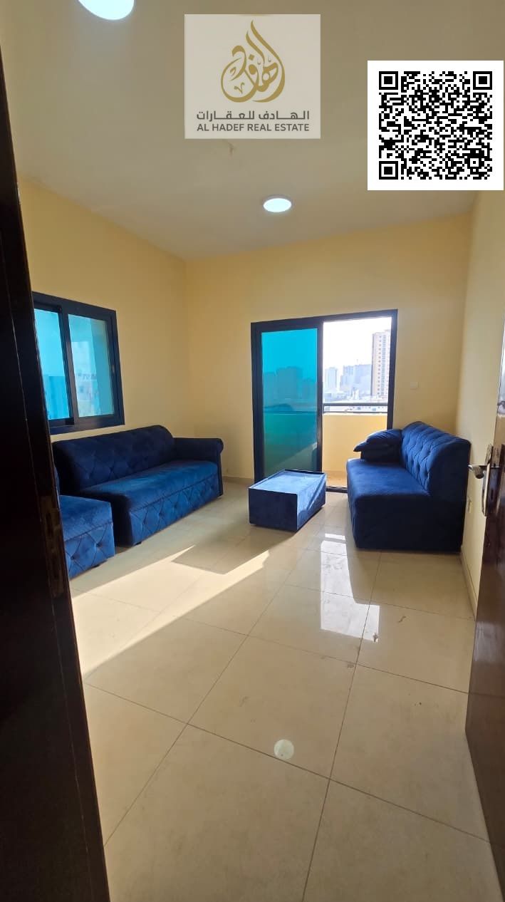 For Annual Rent: Spacious 1 Bedroom Apartment with Balcony and Separate Living Area in Al Nuaimiya 1 on Al Ittihad Street Location Ajman – Al Nuaimiy