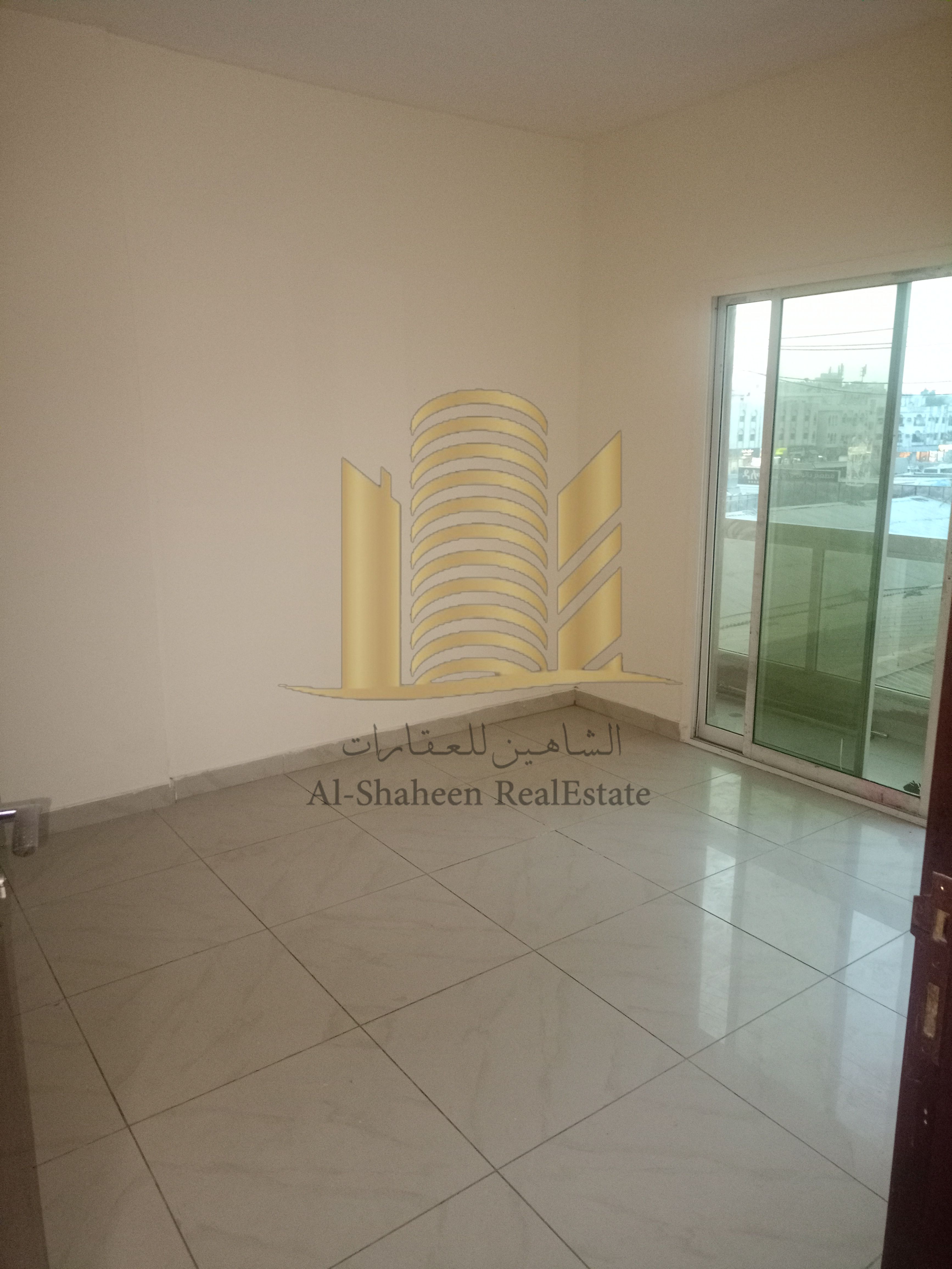 Two-bedroom apartment with a living room for annual rent in Al Nuaimiya 1, Ajman, behind Hamdan Mall