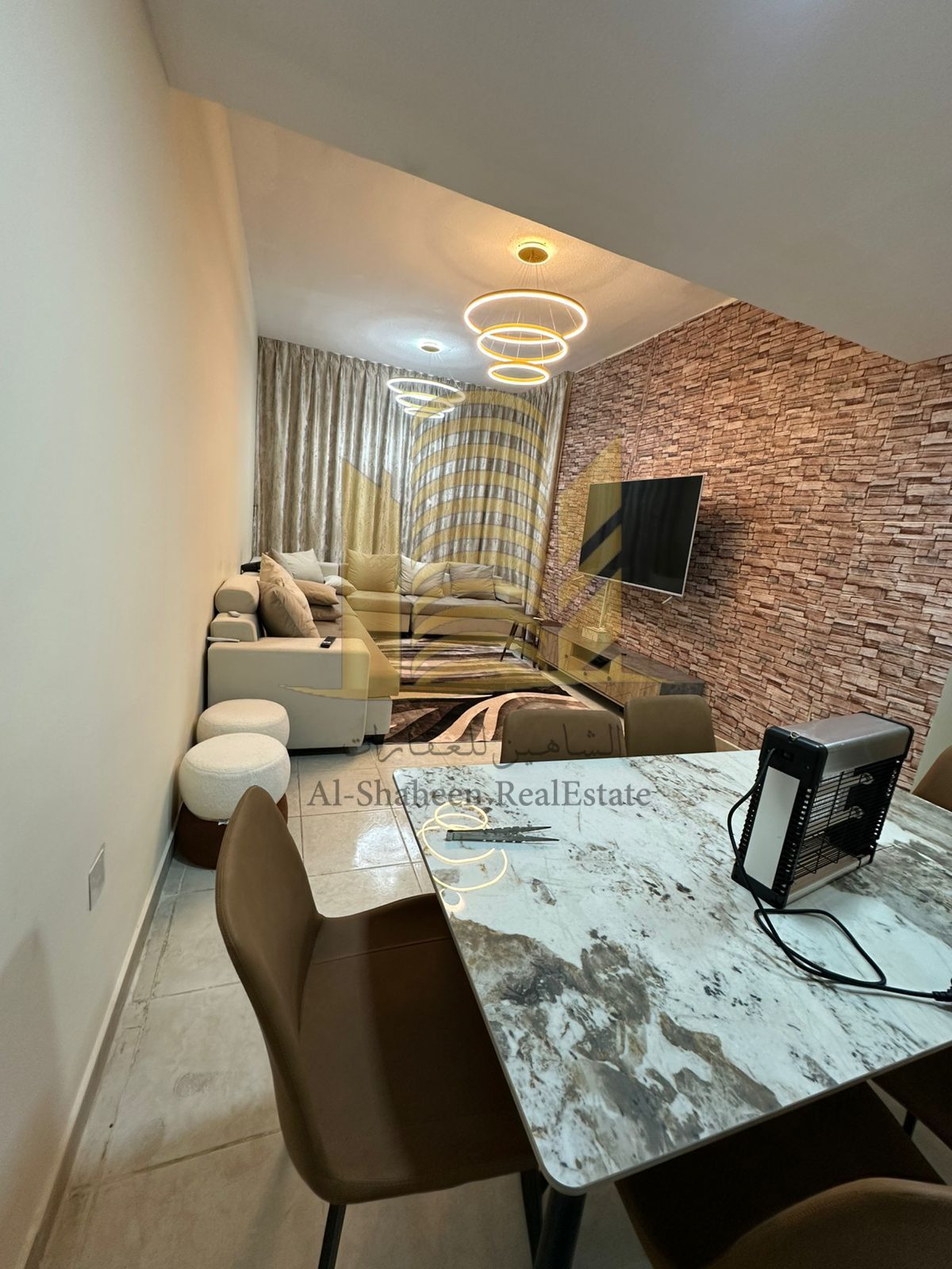 Furnished two-bedroom apartment with a living room in Al Jurf, Ajman, next to Ajman Court.