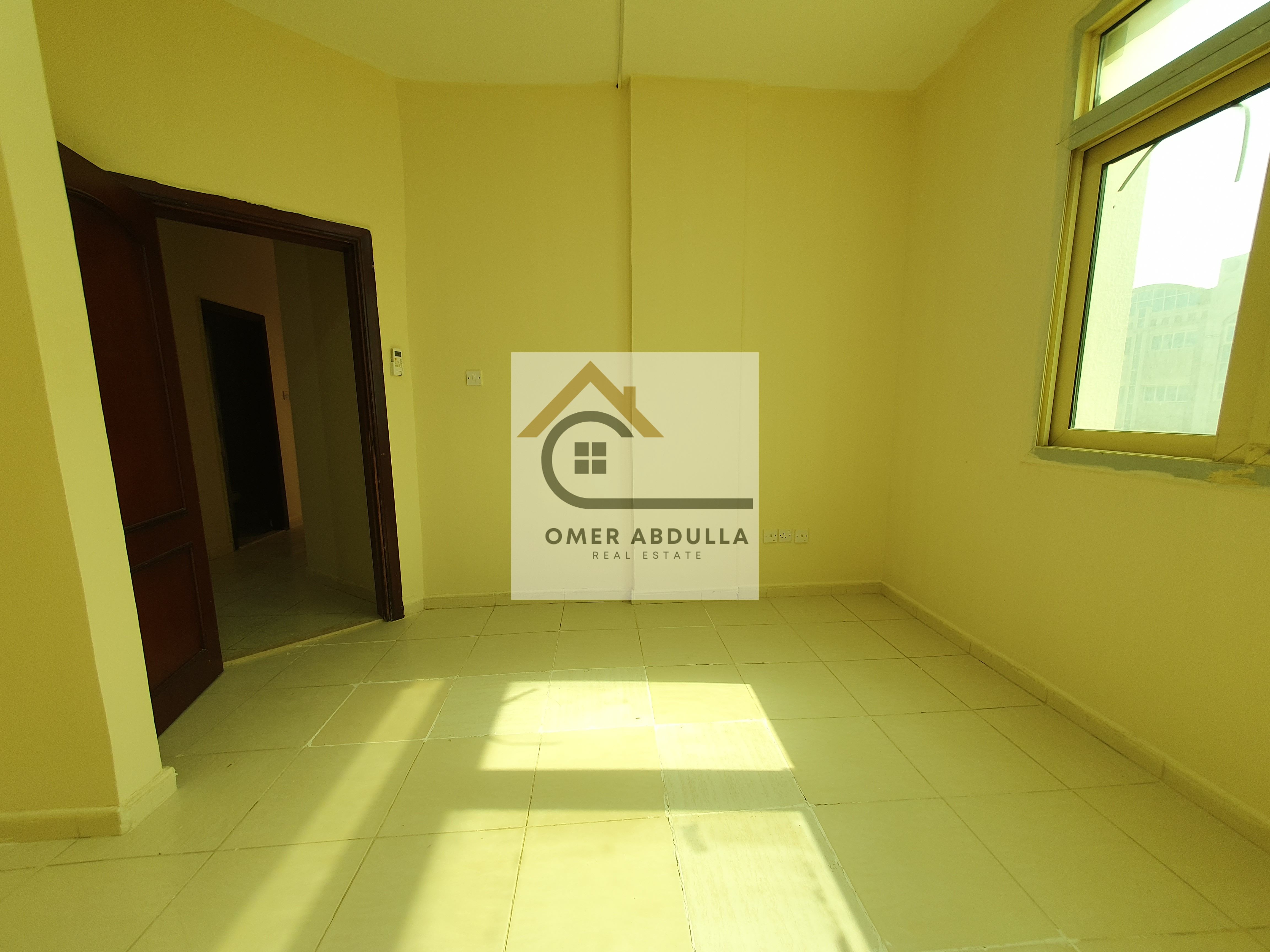 NO DEPOSIT CASH 1BHK WITH CLOSE HAL ON ROAD BUILDING IN MUWAILEH