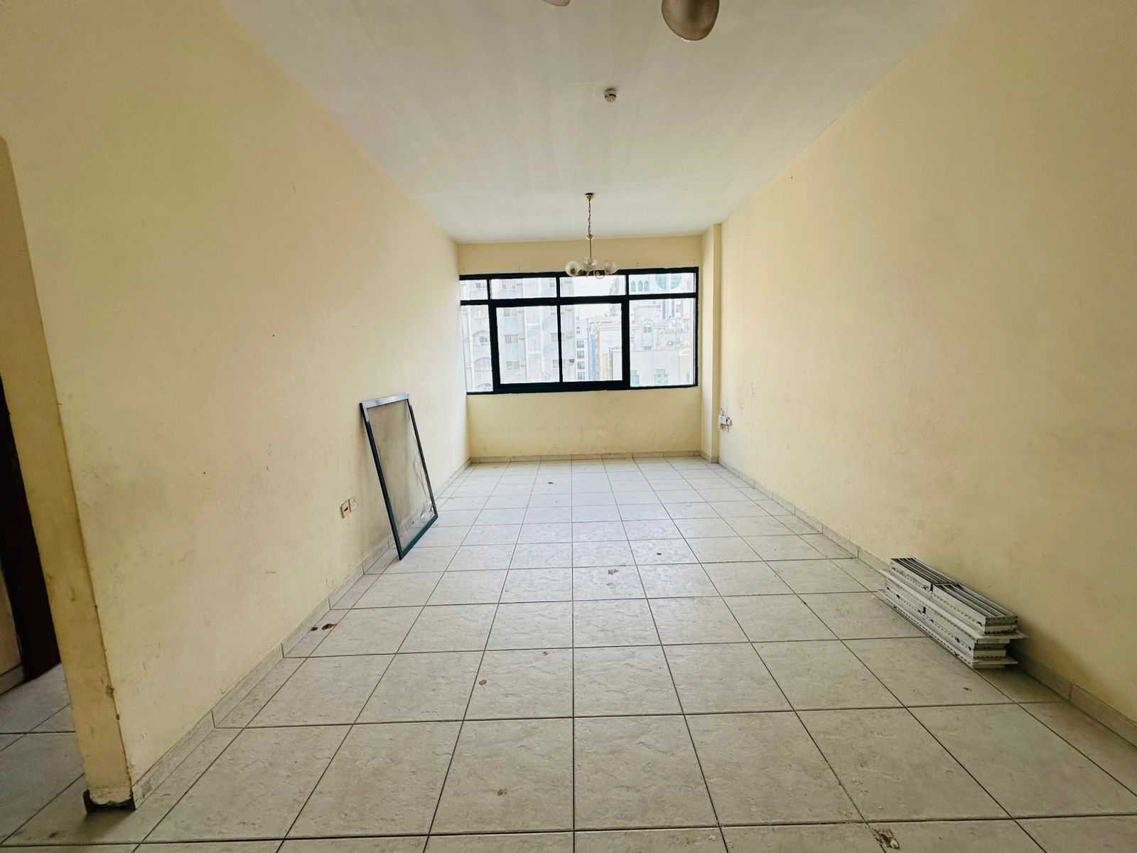 Cheapest 1-bedroom apartment with open view, free AC, in a family building in Al Qasimia Al Mahatta.
