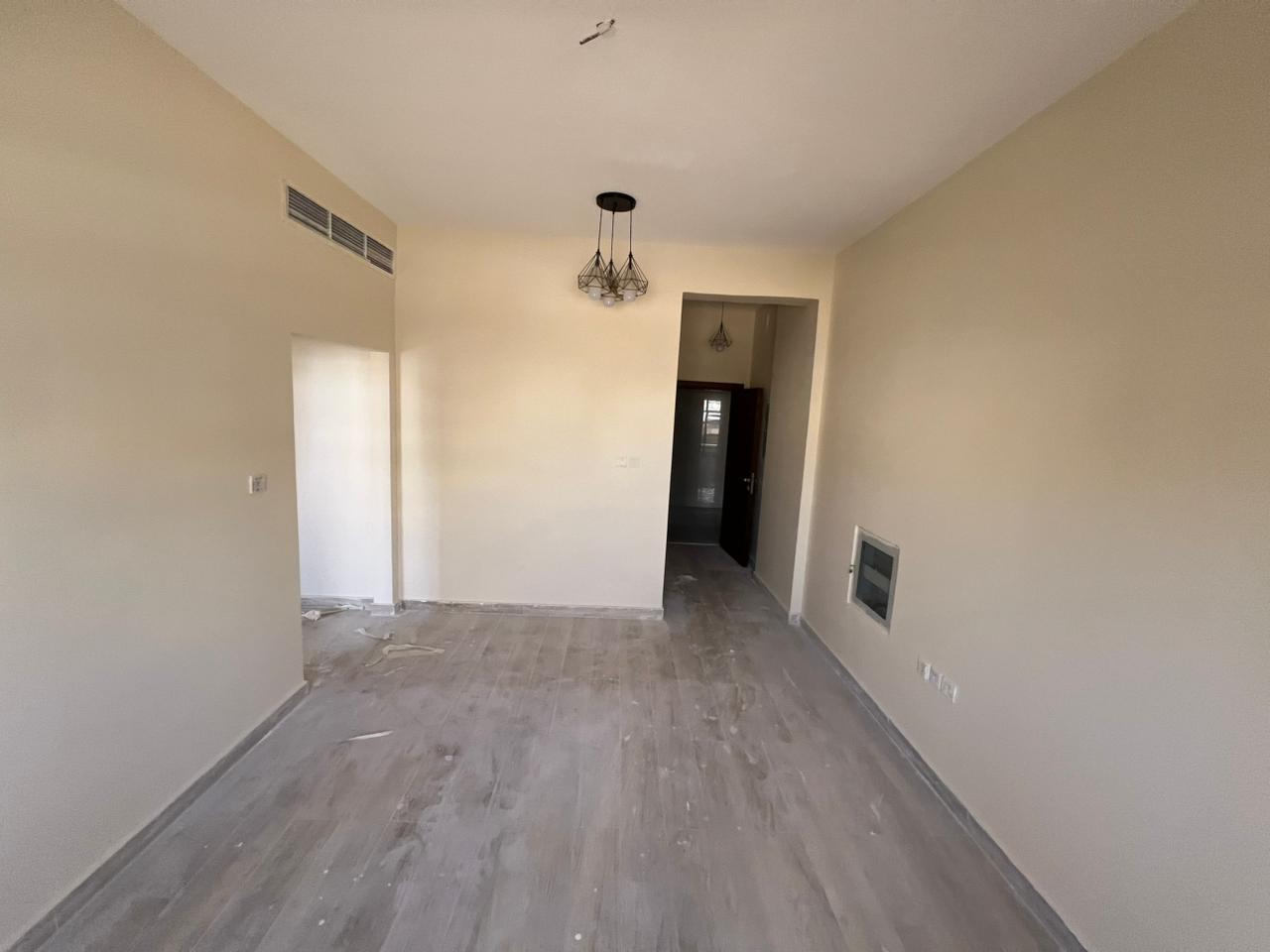 rand new one-bedroom apartment with living room in Al Jurf 3, near Ajman Festival and behind the Chinese Market, with central air conditioning and mai