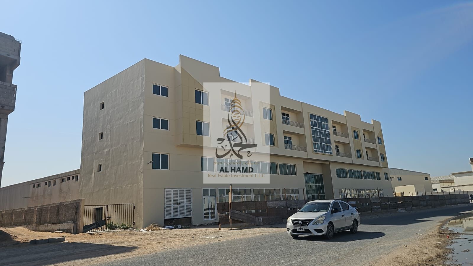 For sale direct from owner in the industrial Complex Building G+m+2 &shed road of umm Al thoob new industerial 80000sqft