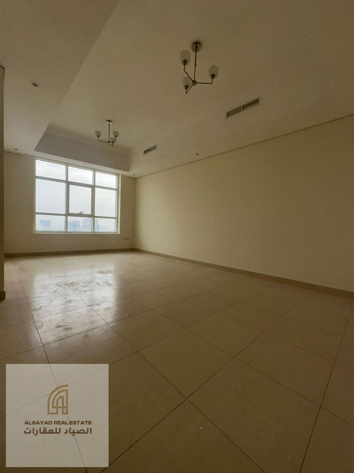 3-bedroom apartment with a living room in Al Taawun, on Al Mamzar Corniche, with a maid's room and parking.
