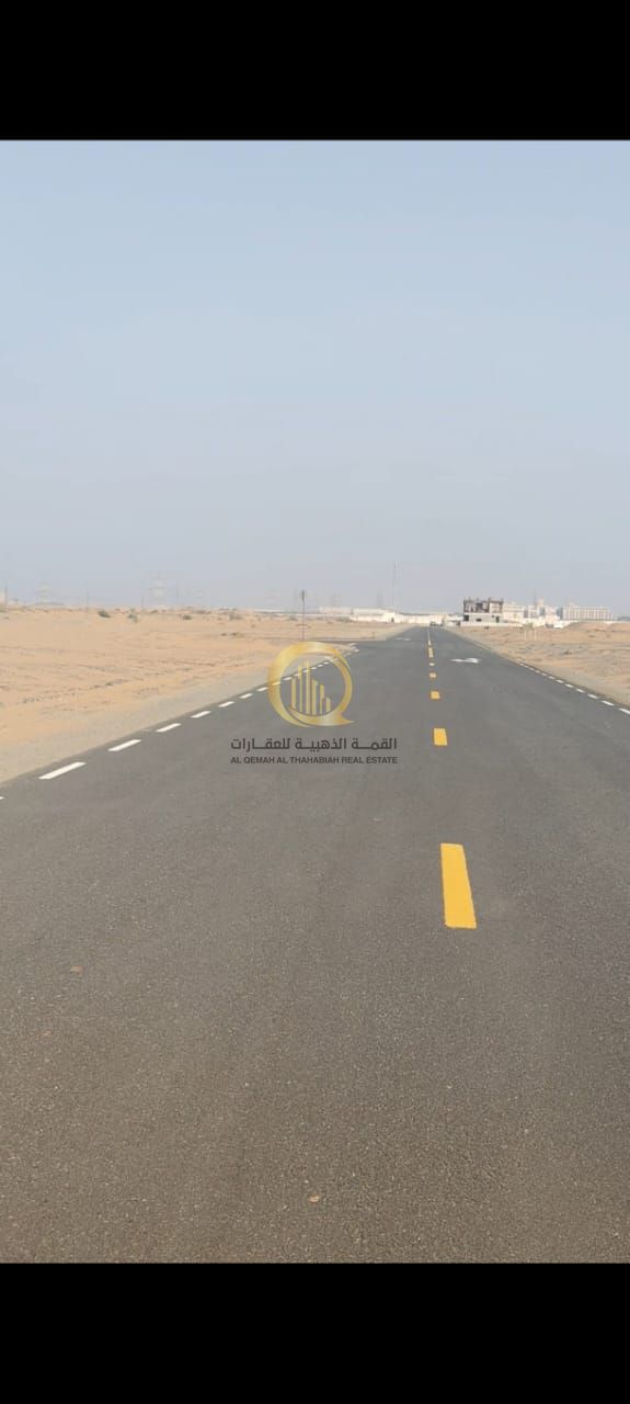 For sale in Rawdat Al-Qurt: a commercial-residential plot of land. Its area is 5,274 sq ft, located on a corner street and alley, very close to the pa