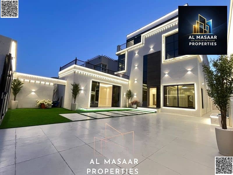Luxury villa for sale in Rawda 3, 5000 sq ft, with 6 master bedrooms and a spacious roof terrace.