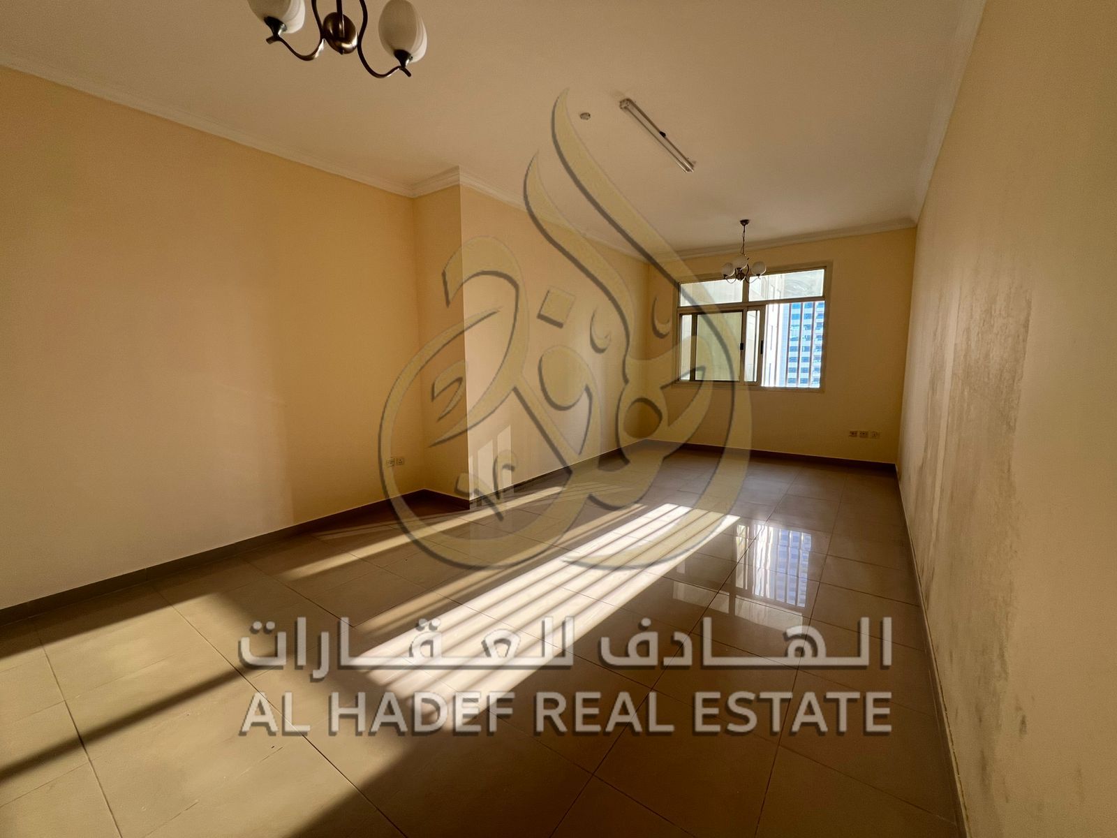 Two-bedroom apartment with a living room, balcony, and two bathrooms in the Khan area.