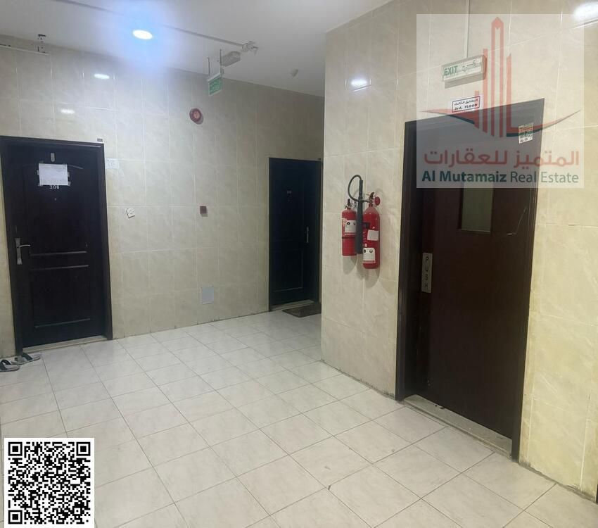 For annual rent in Ajman: two bedrooms, a living room, two bathrooms, and a balcony in Hashim Building in Al Bustan. Asking price: 35,000