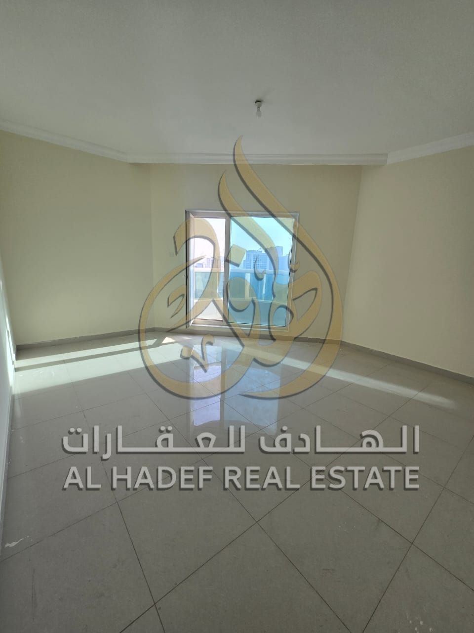 For annual rent in Sharjah: 3 bedrooms with a balcony, built-in wardrobes, free air conditioning, free parking, with a swimming pool and free gym.