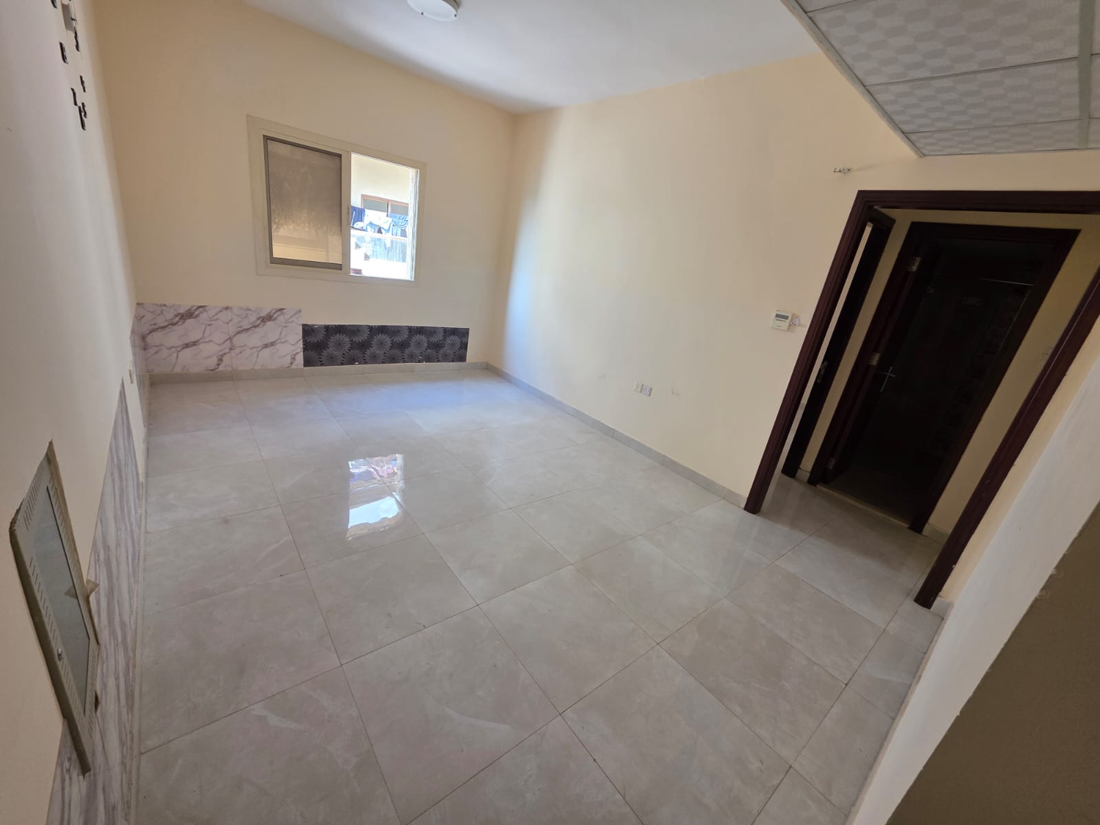 Practical accommodation with high-end finishes and spacious areas in a prime location in Al Jurf 2, Ajman, on a main street.