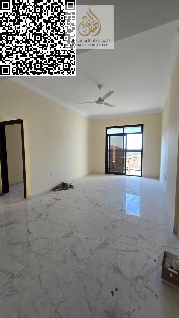 Two bedrooms, a living room with a balcony, three bathrooms, first occupancy, ready to move in, spacious, excellent design in Al Jurf 3