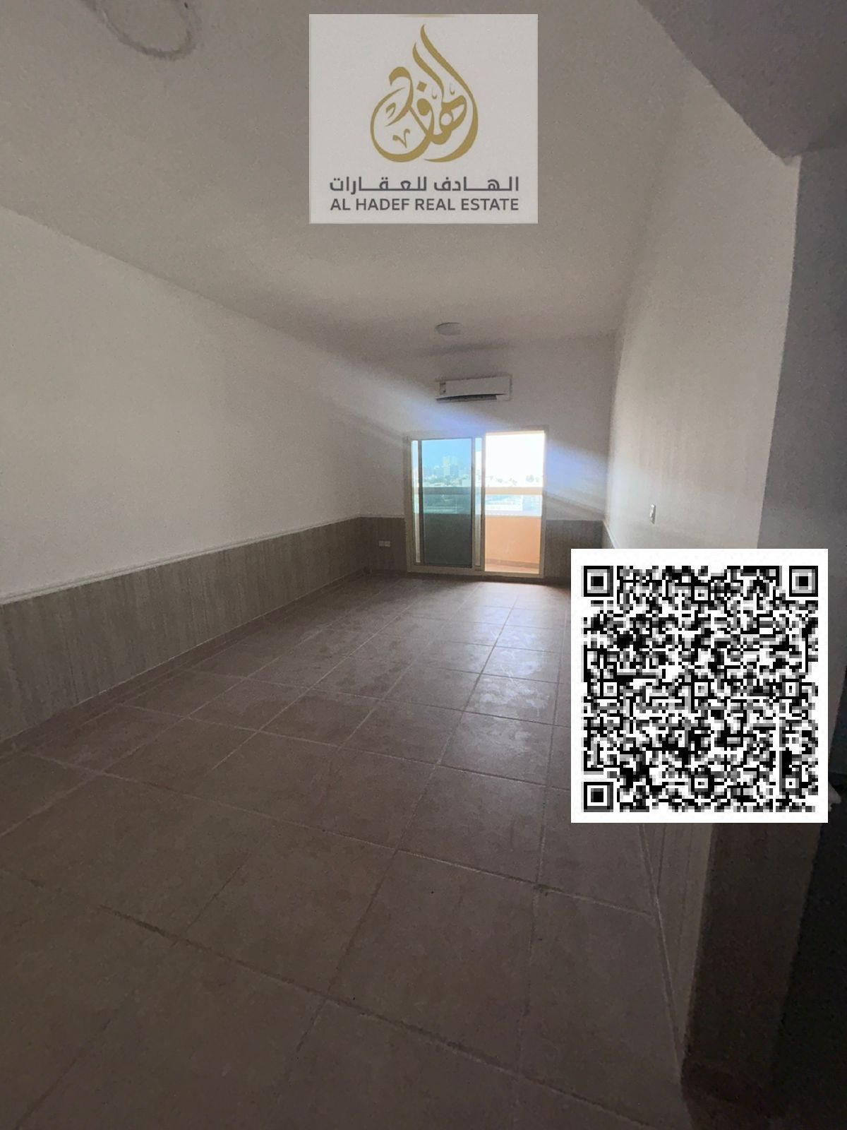 For rent in Ajman, a two-bedroom apartment with a living room in Al Rawda 2, behind Layali Beirut. Very spacious with a balcony and three bathrooms. R