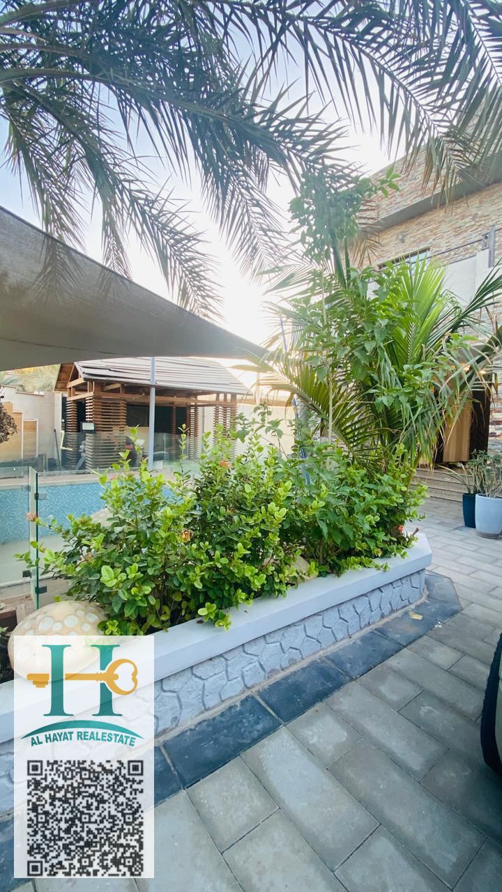 A distinctive residential investment villa for sale in Al Rawda 3, corner plot on two asphalt roads, ideal for family living or investment.