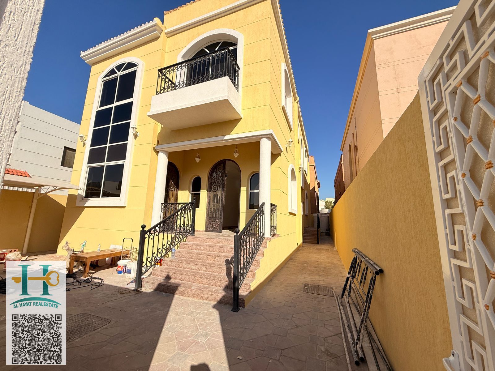 : For sale, a residential villa in Al Rawda 2, Consisting of 5 master bedrooms, Two spacious living halls and one majlis,
