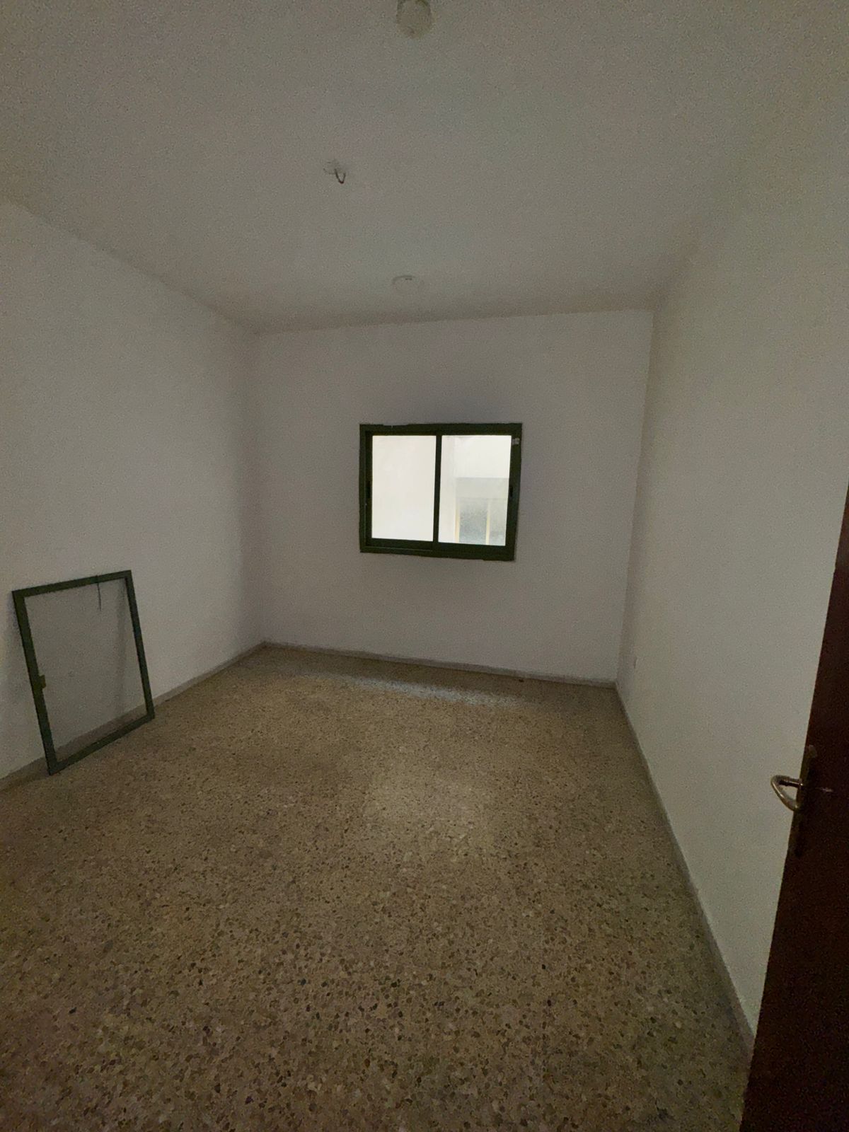 For rent in Sharjah – Al Qasimia area Two-bedroom apartment with a living room Large and spacious areas Balcony Excellent location on a main s