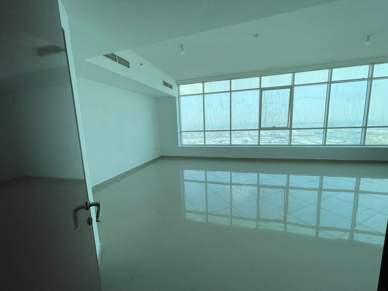 Two-bedroom apartment with living room in Al Majaz 2, featuring a maid’s room, sea view, all rooms master, and maid’s room included.