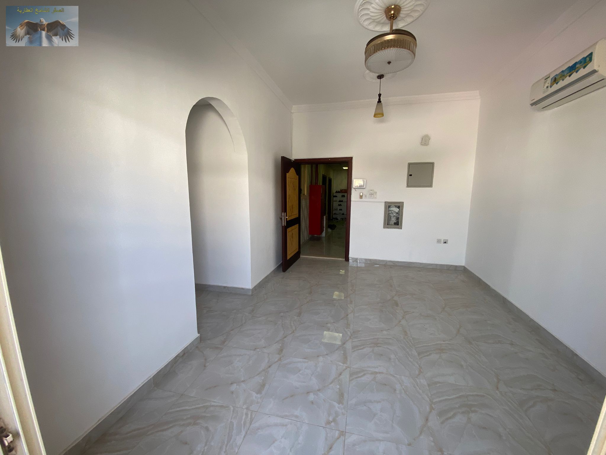 One-bedroom apartment with living room, spacious layout, super deluxe finishes, located on the Sharjah–Dubai exit, close to all amenities.