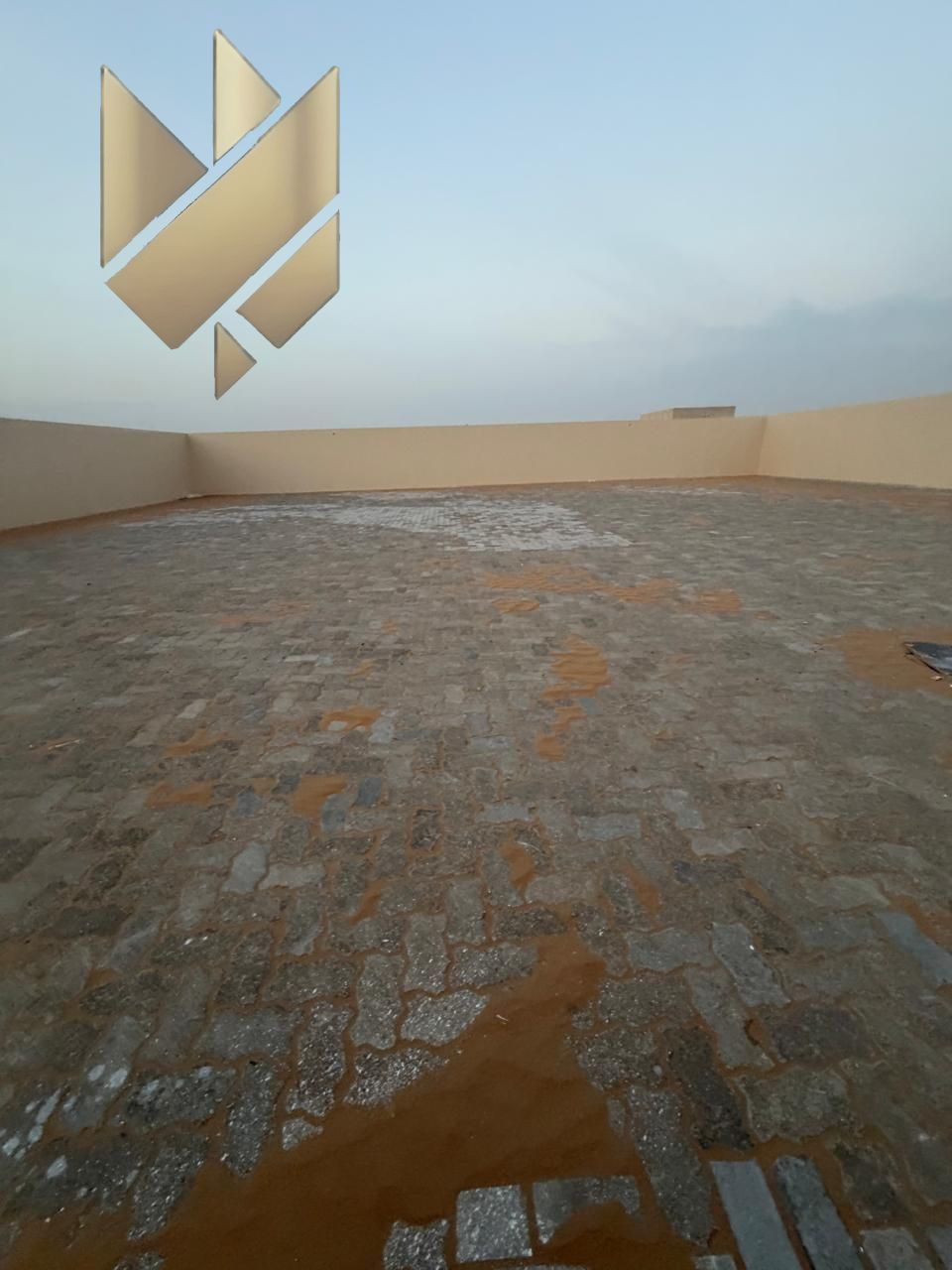 For Rent – Yard in Al Saja’a | Prime strategic location | Fully fenced | Interlock flooring | 24 kW electricity | Large area | Office for business ope