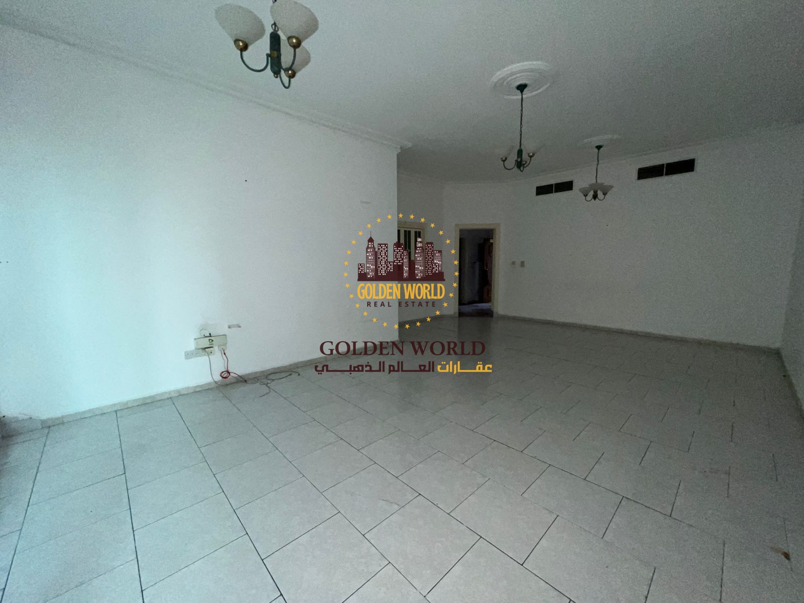 Spacious two-bedroom apartment with living area in Al Majaz 2, practical layout, free air conditioning, comfortable living space
