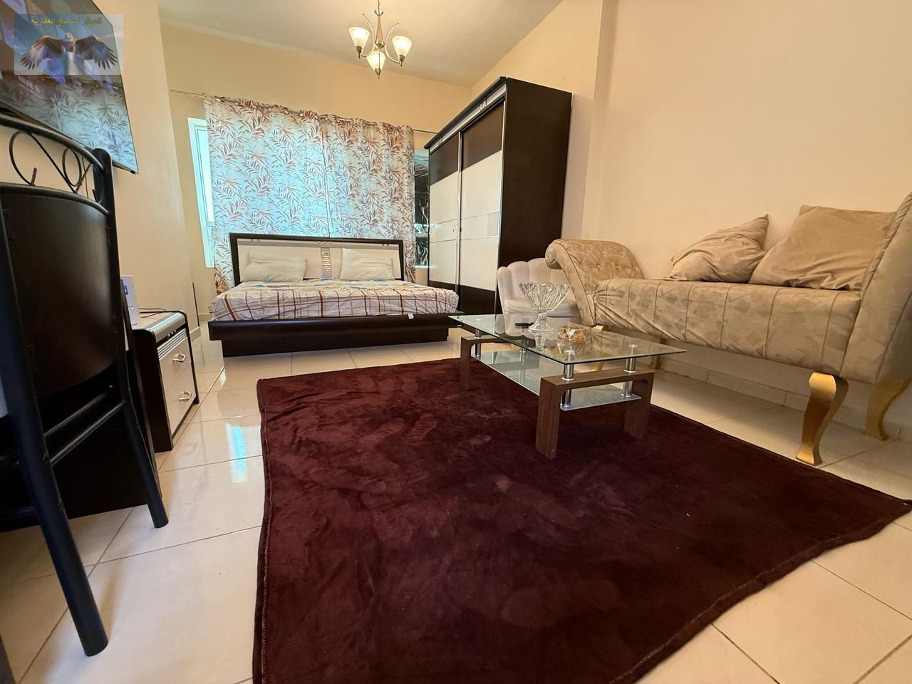 Fully furnished studio for annual rent, all bills included, with gym, pool, and parking, no security deposit, ready for immediate move-in.