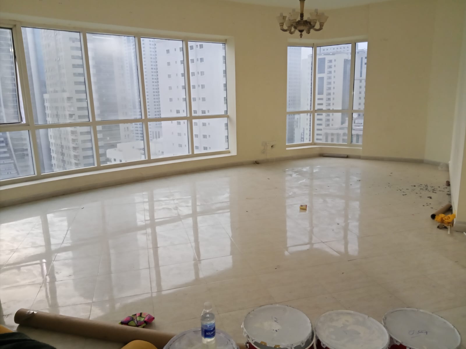 Apartment for rent in Al Majaz 3, 2 bedrooms and living room, direct sea view, central AC, free pool & gym, full maintenance, AED 65,000, 4 payments.