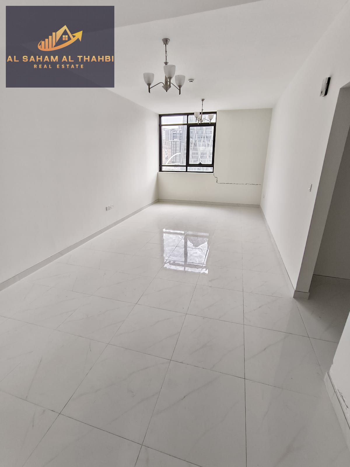 For rent – Two-bedroom apartment with living room, first occupancy, in Al Taawun with parking