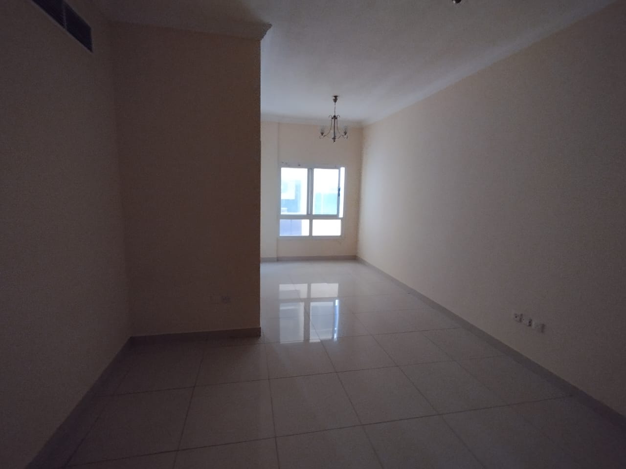 One bedroom and living room in Al Nuaimiya, near Kuwait Street Near Ramada Black Hotel 2 bathrooms with a master bedroom