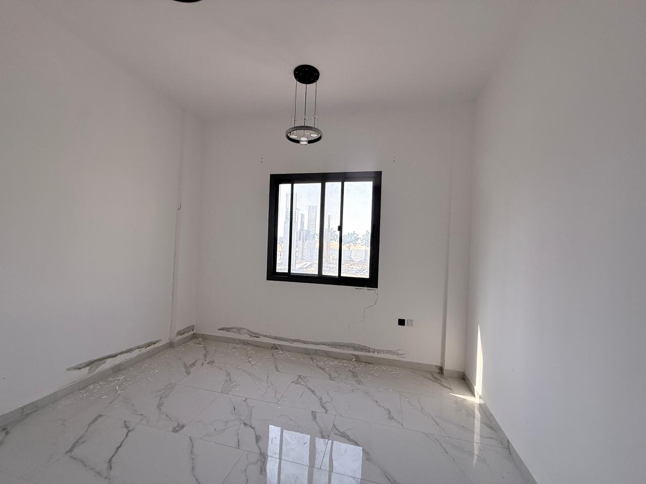 Two bedrooms and a living room in Al-Aliya, prime location, annual rent