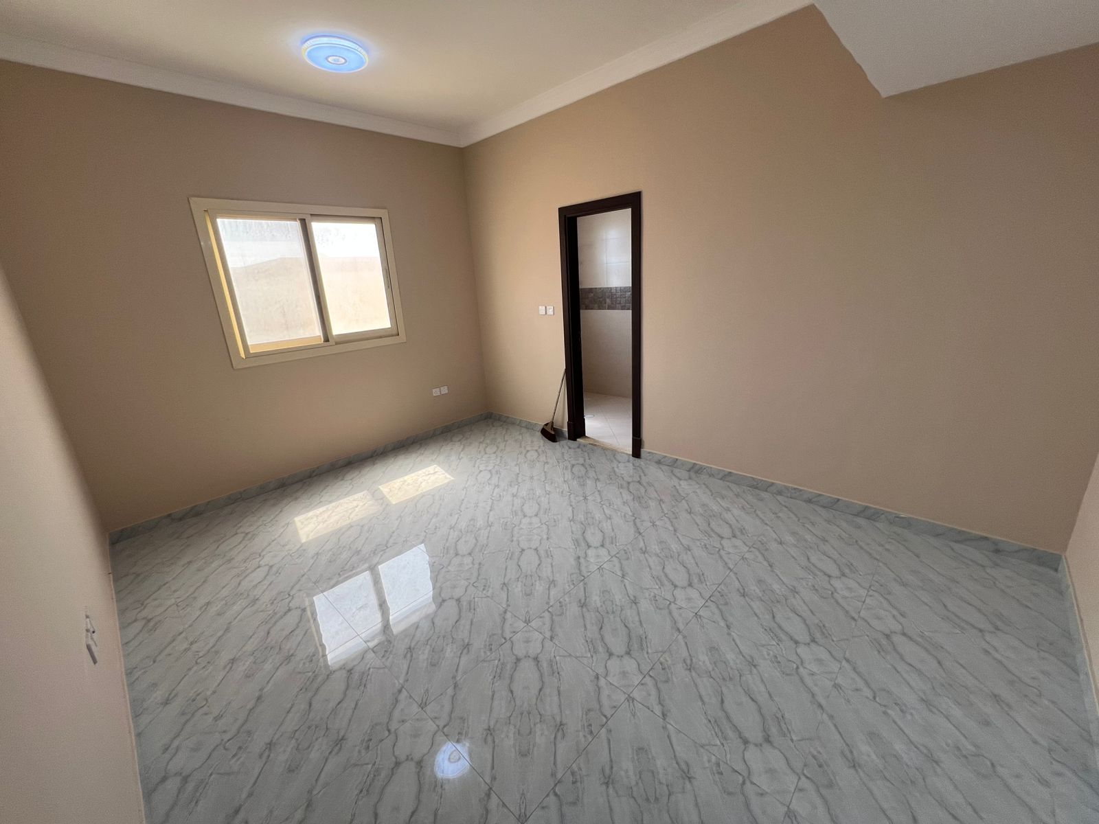 Two-bedroom apartment for rent in Al Rawda 3, near Al Tallah Supermarket and close to Mohammed Bin Zayed Exit.