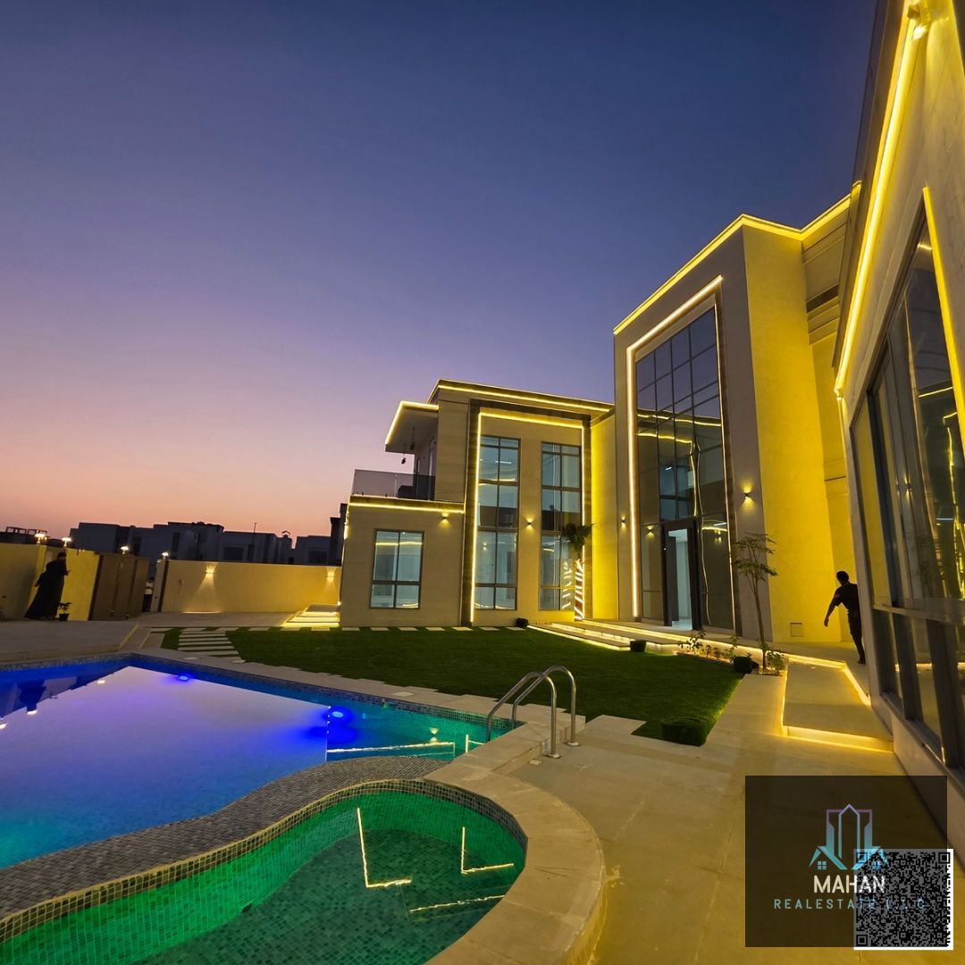Luxury Villa for Sale – Al Yasmin, Ajman Location: Behind the Park Land Area: 10,300 sq ft Built-up Area: 7,500 sq ft Floors: 2 Floors + Roof Access Features: 6 Bedrooms | 9 Bathrooms | 2 Living Rooms Large Majlis with Wash Area & Bathroom Spacious Main K