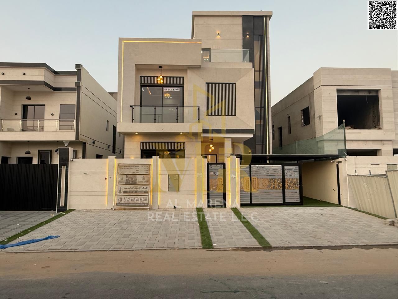 Villa for sale, all-inclusive (registration, ownership, electricity, and air conditioning), on the main street, ready to move in, in one of Ajman's mo
