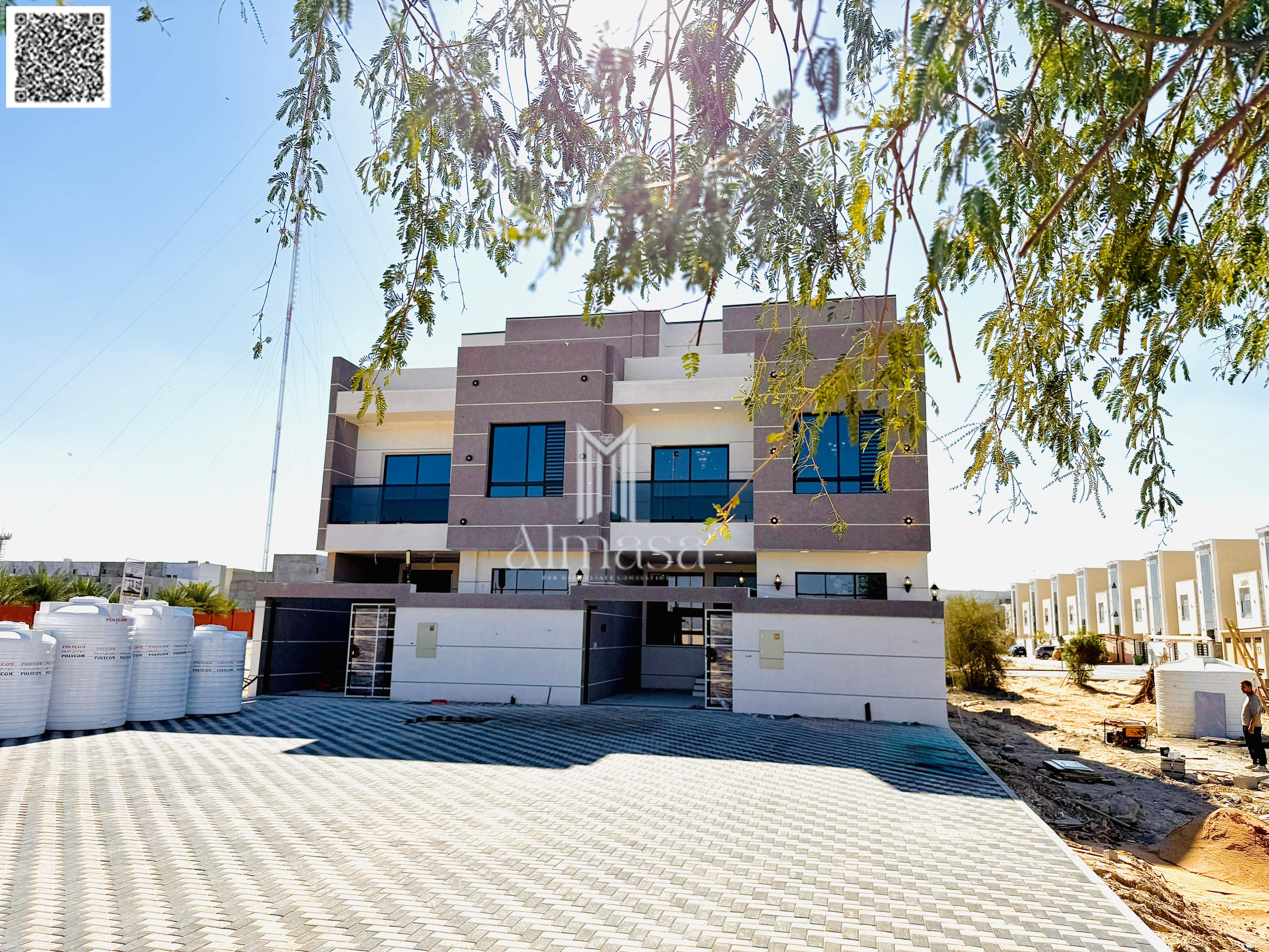 Townhouse for sale in Al Helio – Ajman, located in a quiet and family-friendly residential area with close access to schools, mosques, shopping center